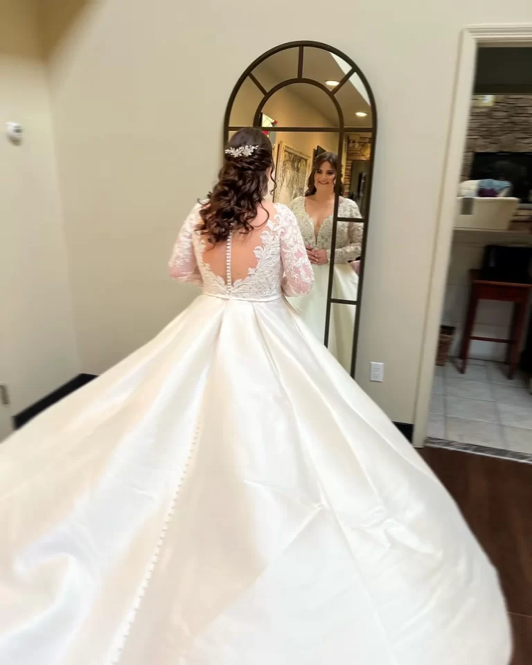 Bridal hair styling with elegant gown by Trish